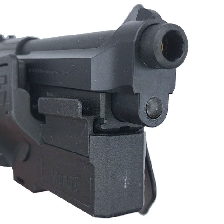 Gros plan système de rétention pontet holster tactique AMOMAX